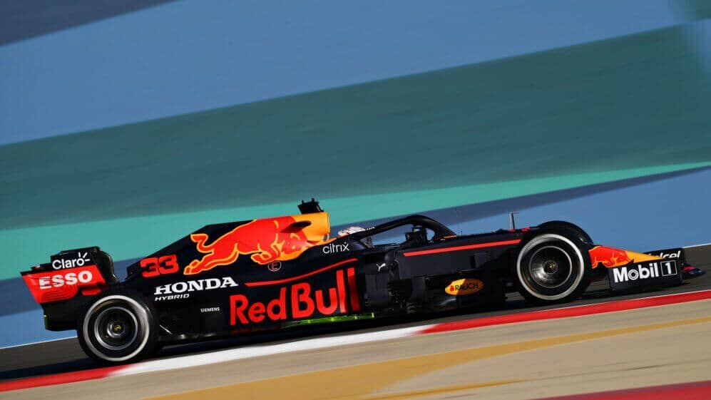 Red Bull car testing on a wet track before the new F1 season.